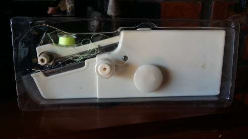 E-Z portable battery operated sewing machine